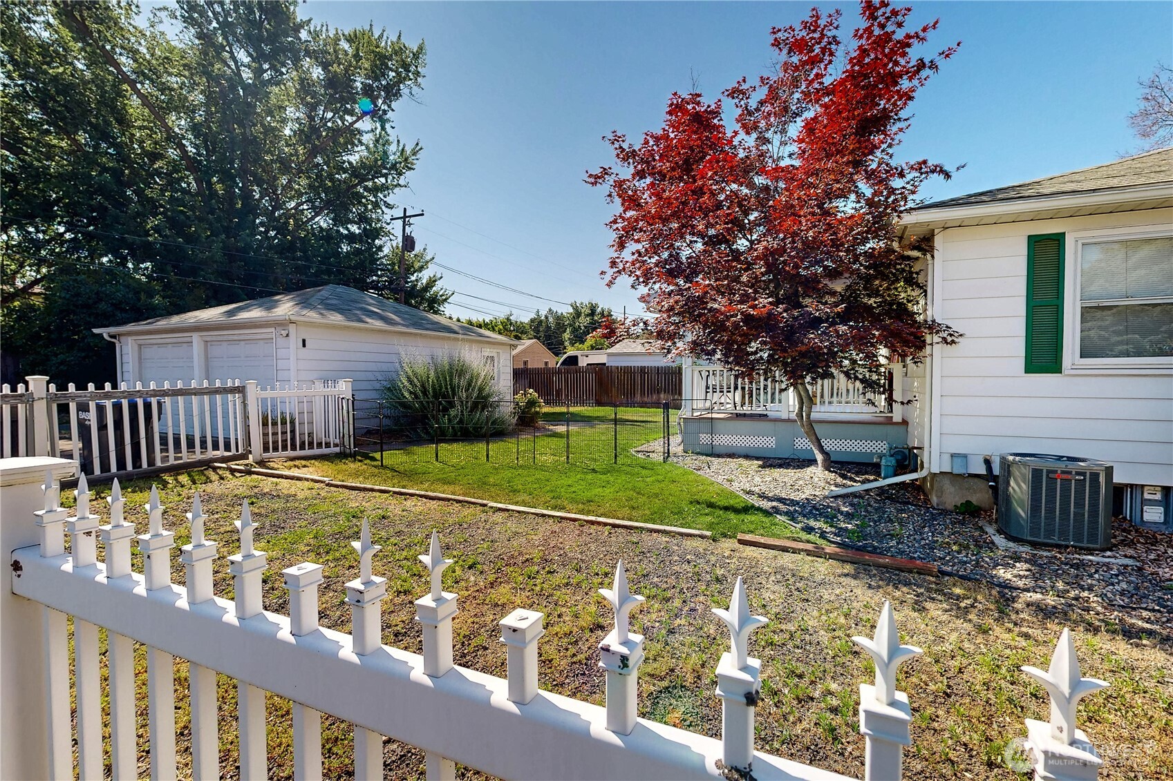 1303 Modoc Street Walla Walla, WA 99362 - Photo 32 of 40 a front view of a house with garden