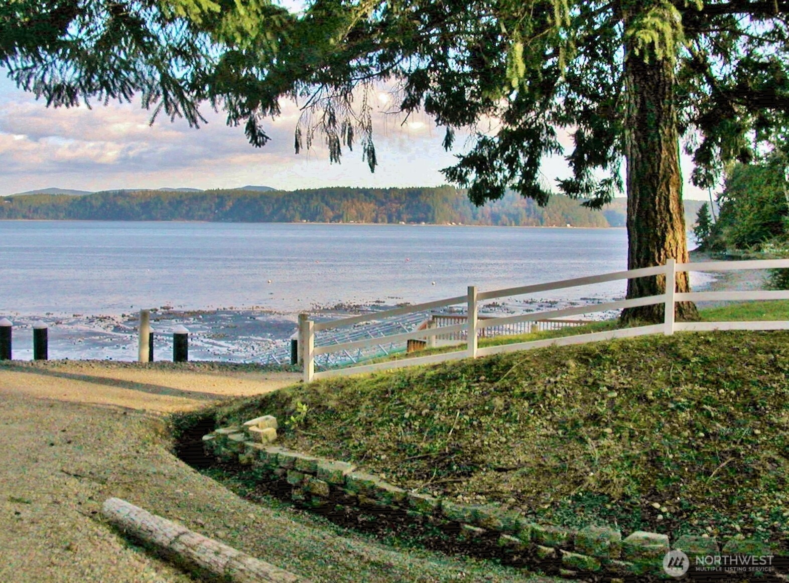 170 Kelly Road Brinnon, WA 98320 - Photo 27 of 29 a view of a backyard with plants and lake view