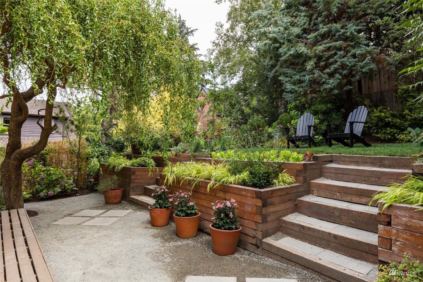 1724 31st Avenue Seattle, WA 98122 - Photo 13 of 34 a view of a patio with chairs and plants