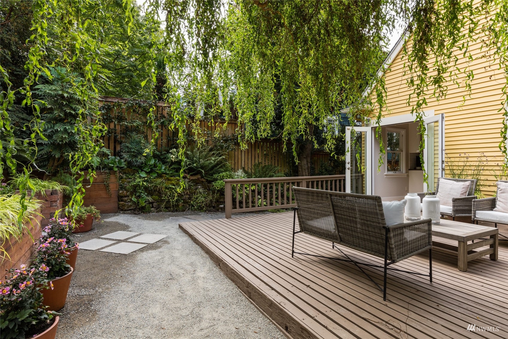 1724 31st Avenue Seattle, WA 98122 - Photo 16 of 34 a view of a wooden bench on the roof deck