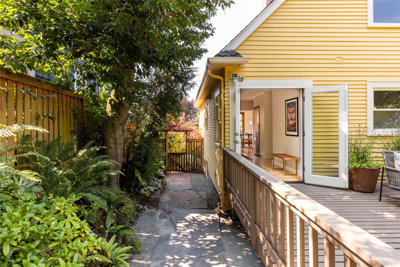 1724 31st Avenue Seattle, WA 98122 - Photo 18 of 34 a view of a house with backyard and sitting area