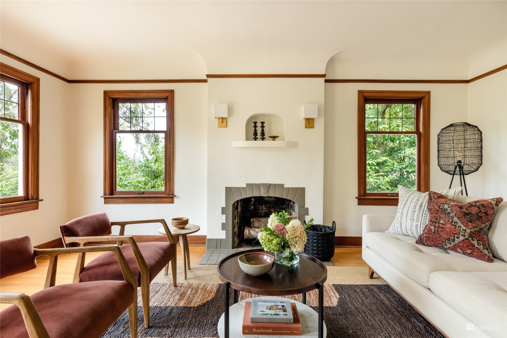 1724 31st Avenue Seattle, WA 98122 - Photo 2 of 34 a living room with furniture and a fireplace