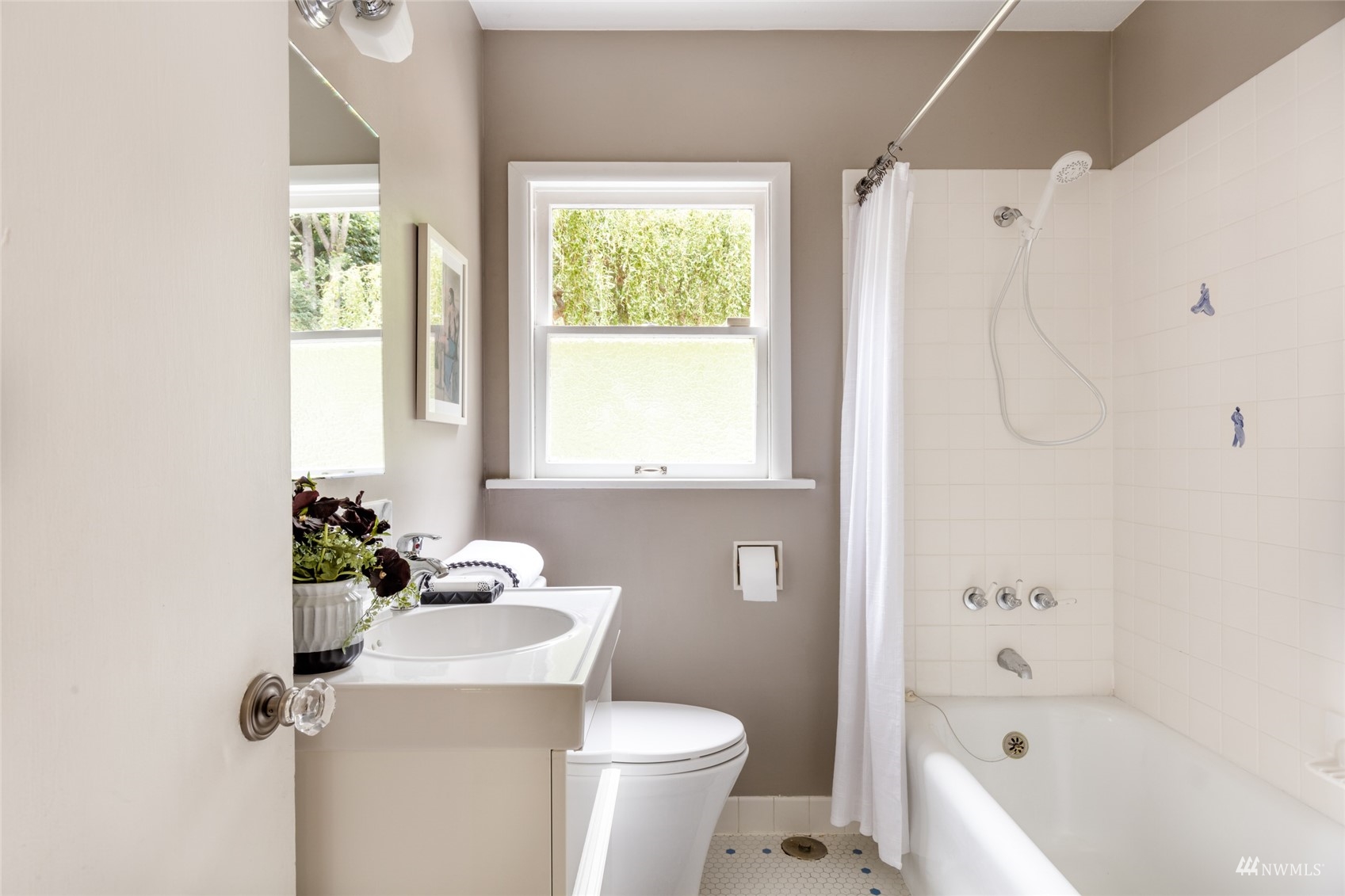 1724 31st Avenue Seattle, WA 98122 - Photo 22 of 34 a bathroom with a sink toilet and shower