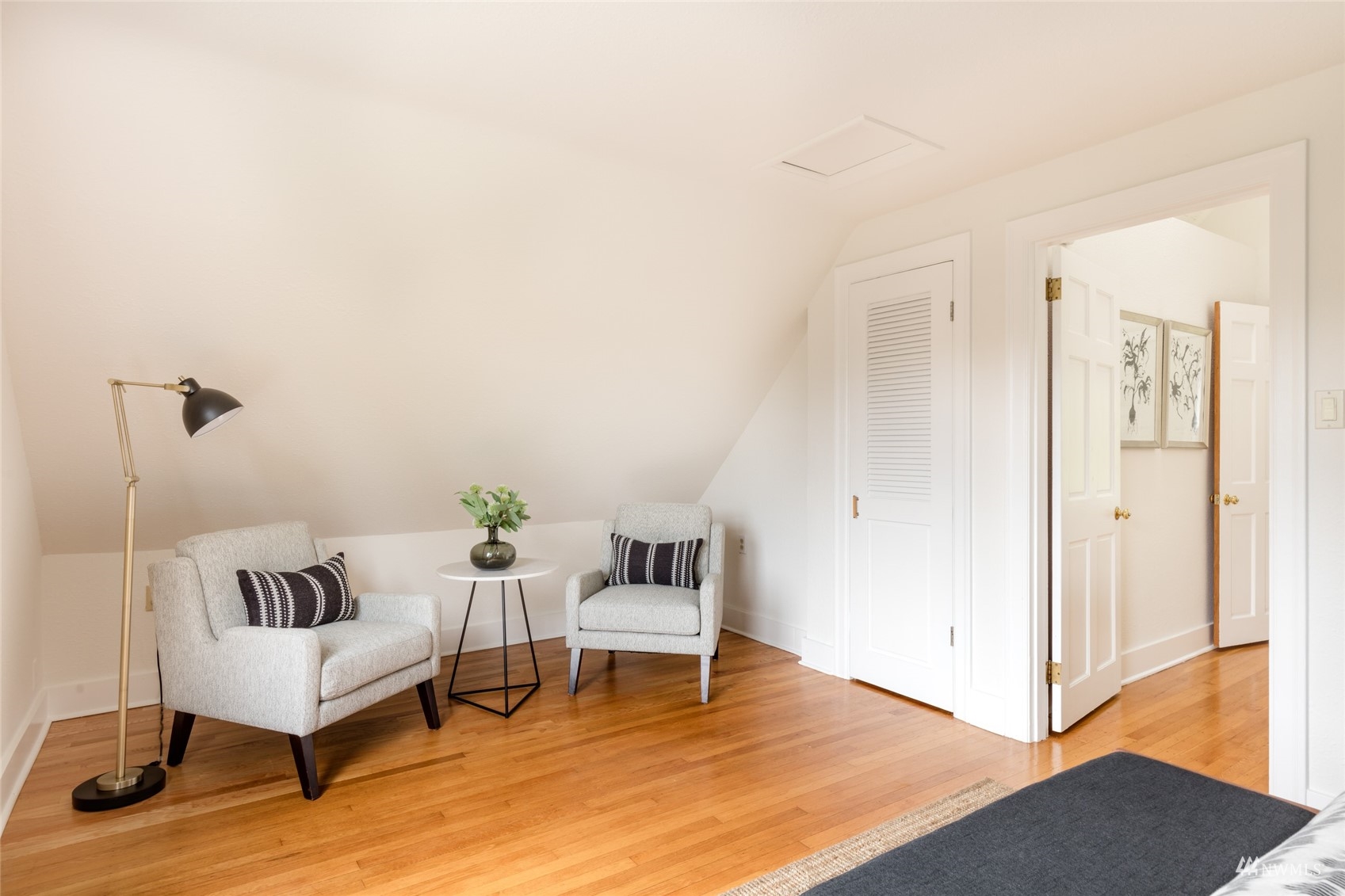 1724 31st Avenue Seattle, WA 98122 - Photo 25 of 34 a living room with furniture and a wooden floor