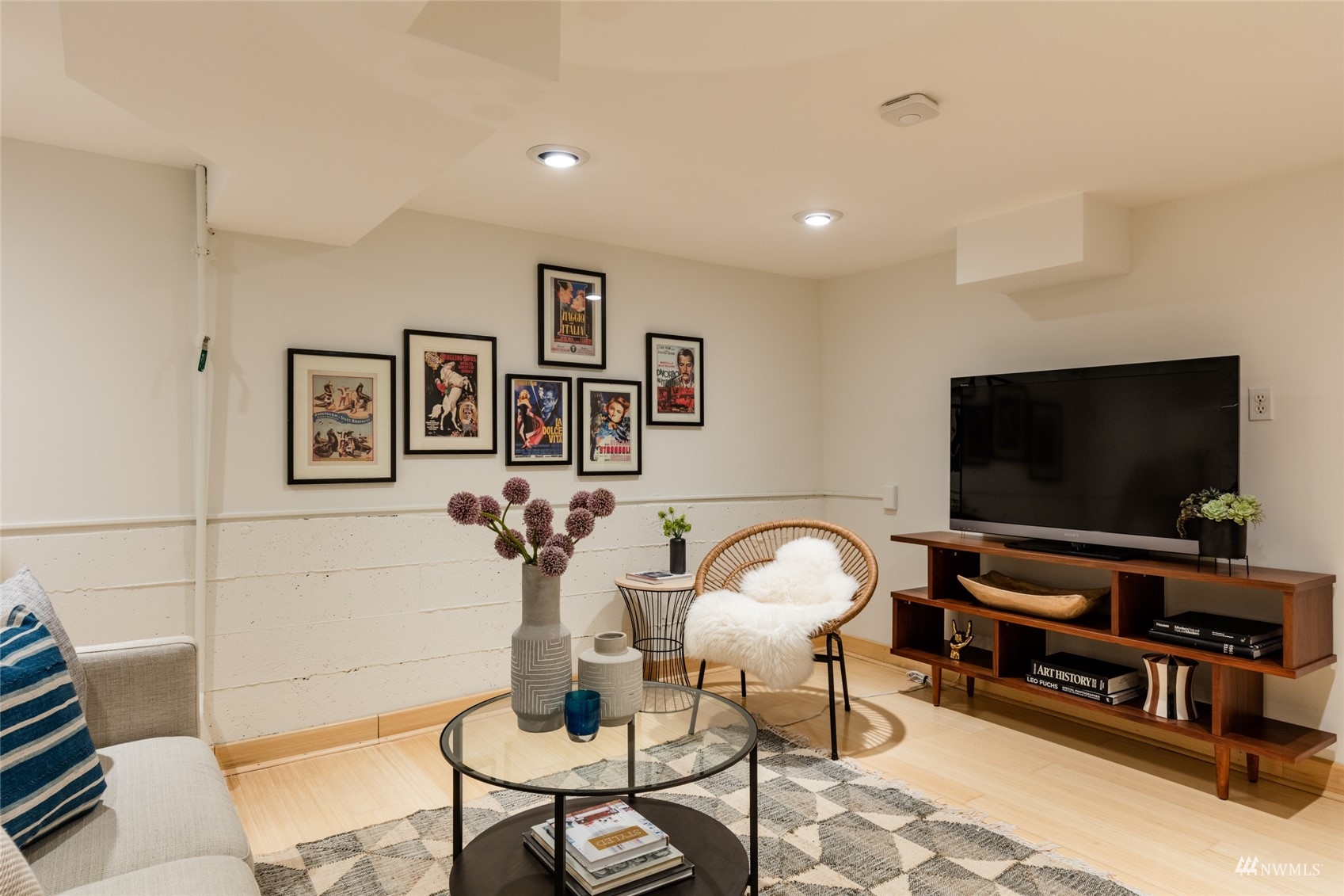 1724 31st Avenue Seattle, WA 98122 - Photo 30 of 34 a living room with furniture and a flat screen tv