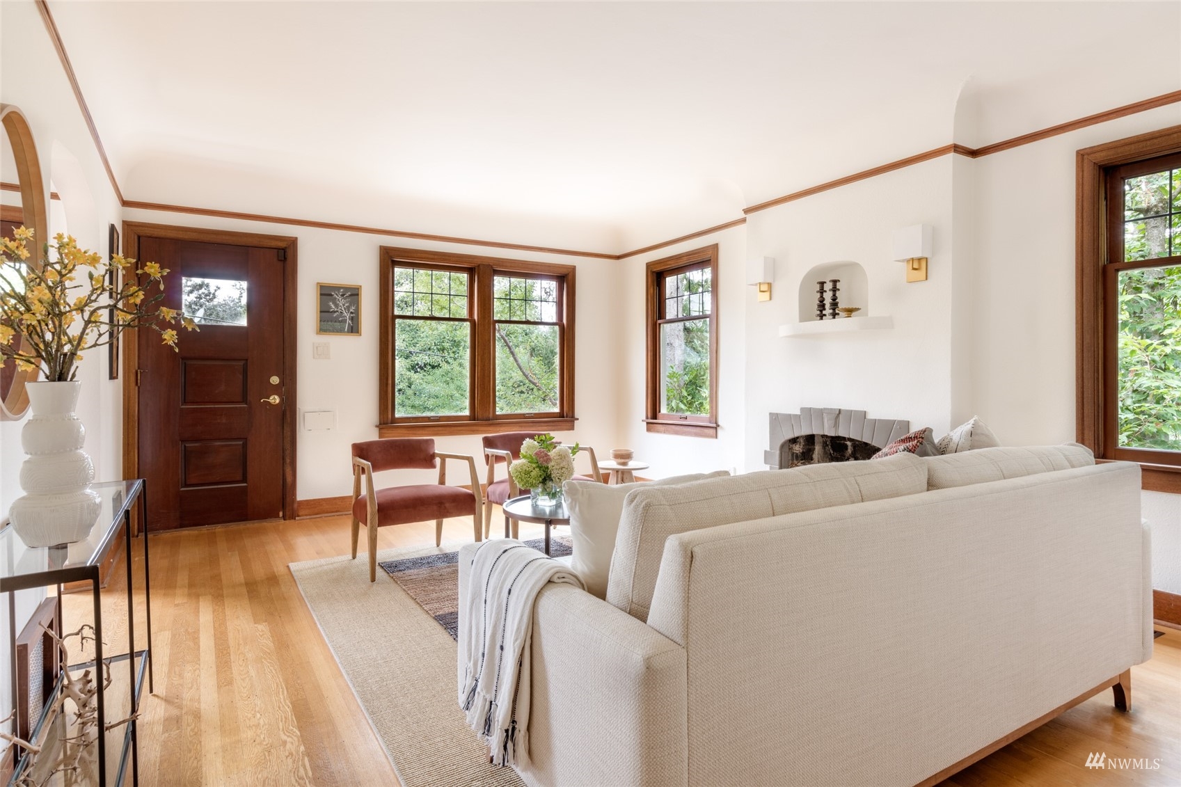 1724 31st Avenue Seattle, WA 98122 - Photo 4 of 34 a living room with furniture and a large window