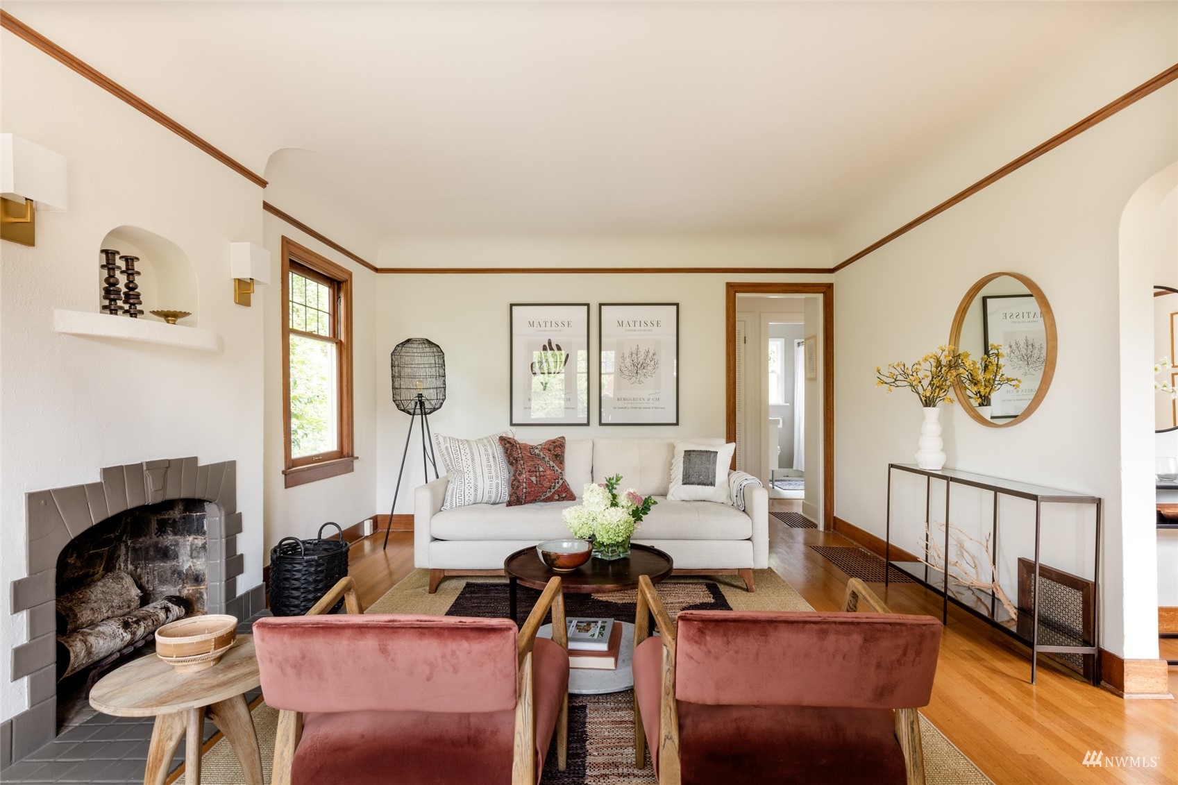 1724 31st Avenue Seattle, WA 98122 - Photo 5 of 34 a living room with furniture a window and a fireplace