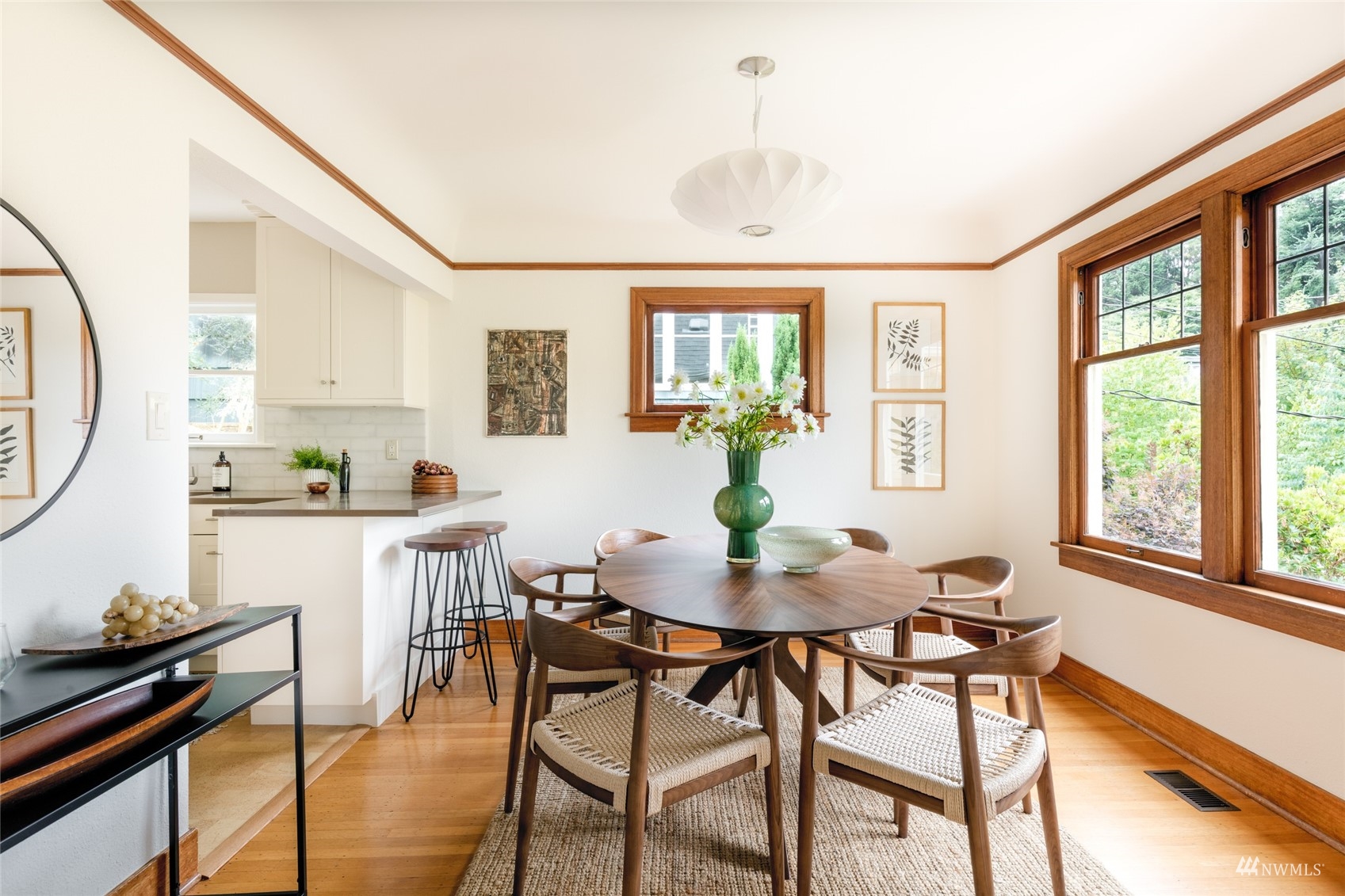 1724 31st Avenue Seattle, WA 98122 - Photo 6 of 34 a view of a dining room with furniture window and outside view