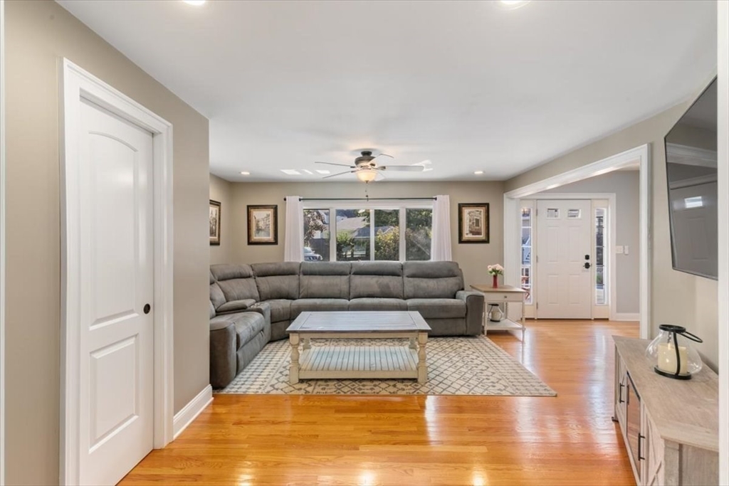 17 Old Essex Road Manchester, MA 01944 - Photo 19 of 40 a living room with furniture and a large window