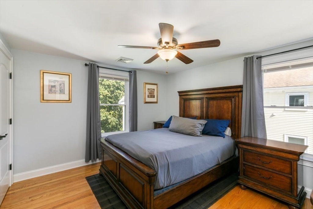 17 Old Essex Road Manchester, MA 01944 - Photo 23 of 40 a bedroom with a bed and window