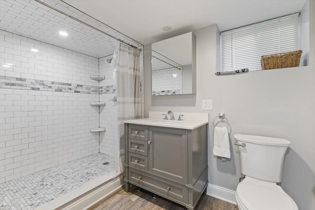 17 Old Essex Road Manchester, MA 01944 - Photo 29 of 40 a bathroom with a sink toilet and shower