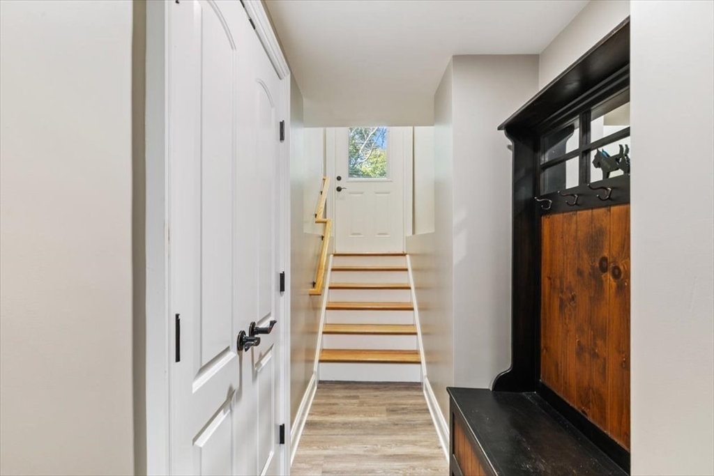 17 Old Essex Road Manchester, MA 01944 - Photo 33 of 40 a view of a hallway with wooden floor and entryway