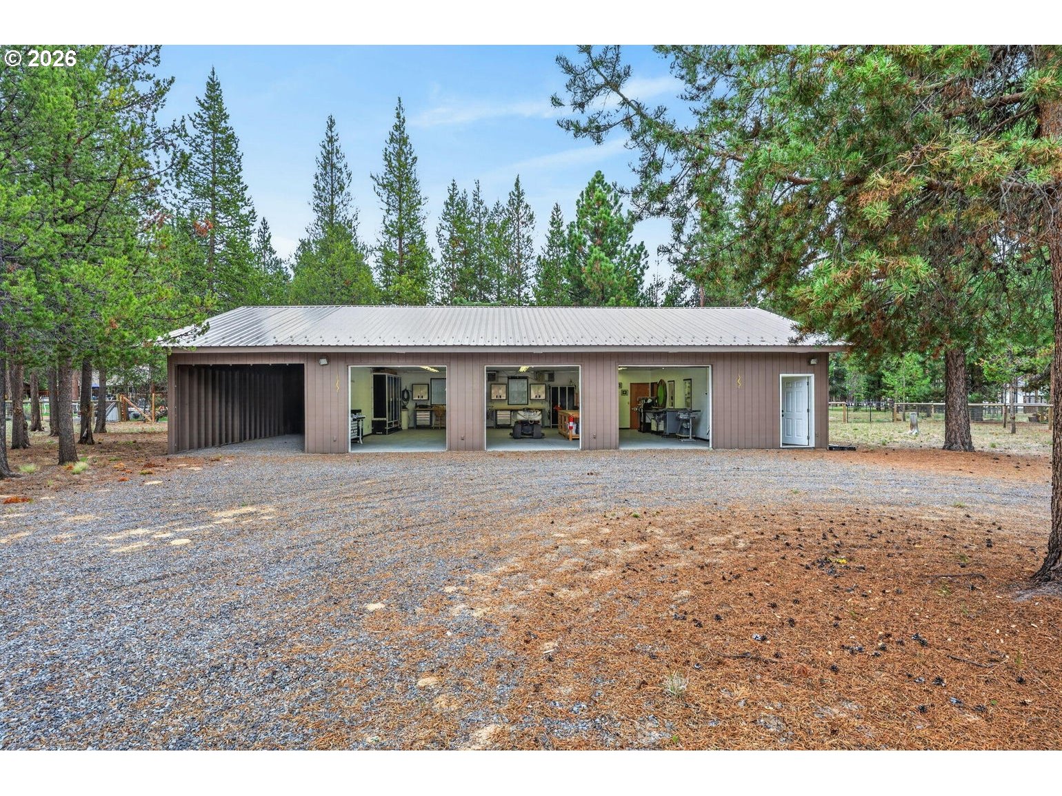 52628 Ammon Road, Unit 3 La Pine, OR 97739 - Photo 11 of 37 a front view of a house with a garden
