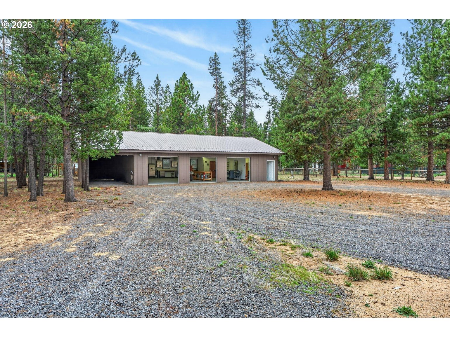 52628 Ammon Road, Unit 3 La Pine, OR 97739 - Photo 9 of 37 a front view of a house with a garden