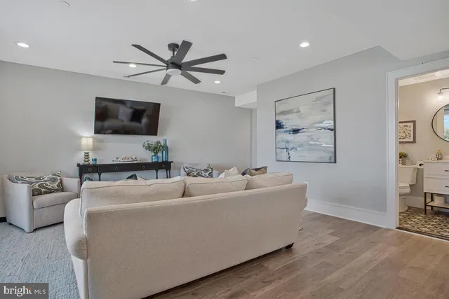 a bedroom with a bed and a table