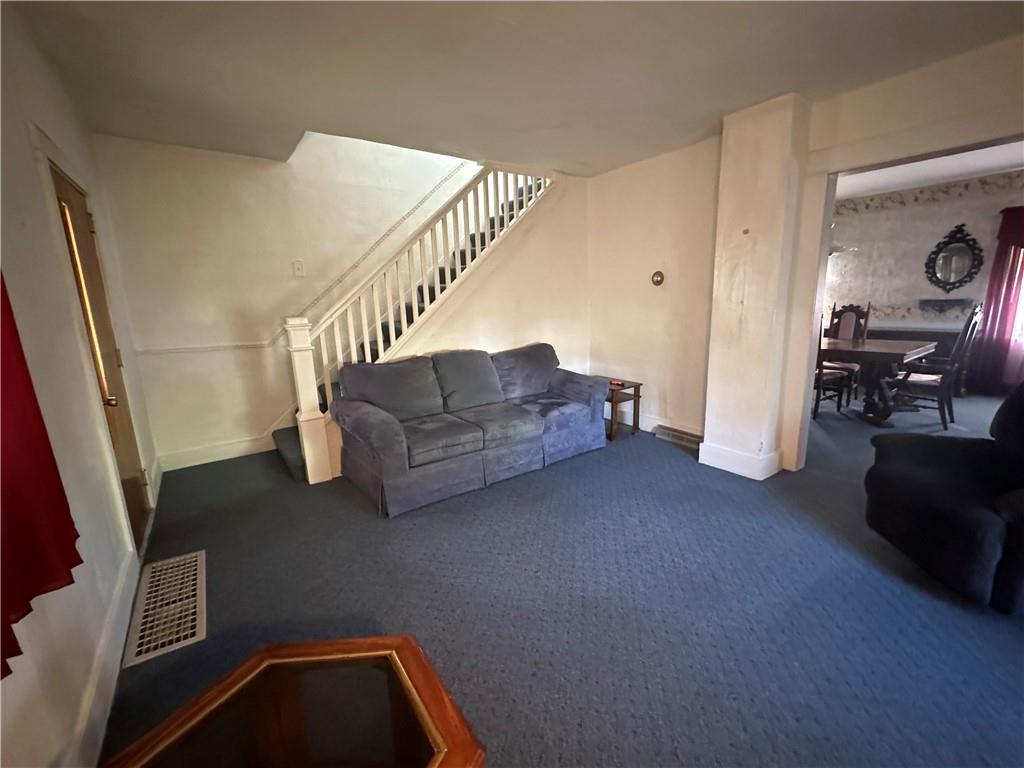 2268 McIntyre Road McIntyre, PA 15756 - Photo 10 of 17 a living room with furniture and a couch