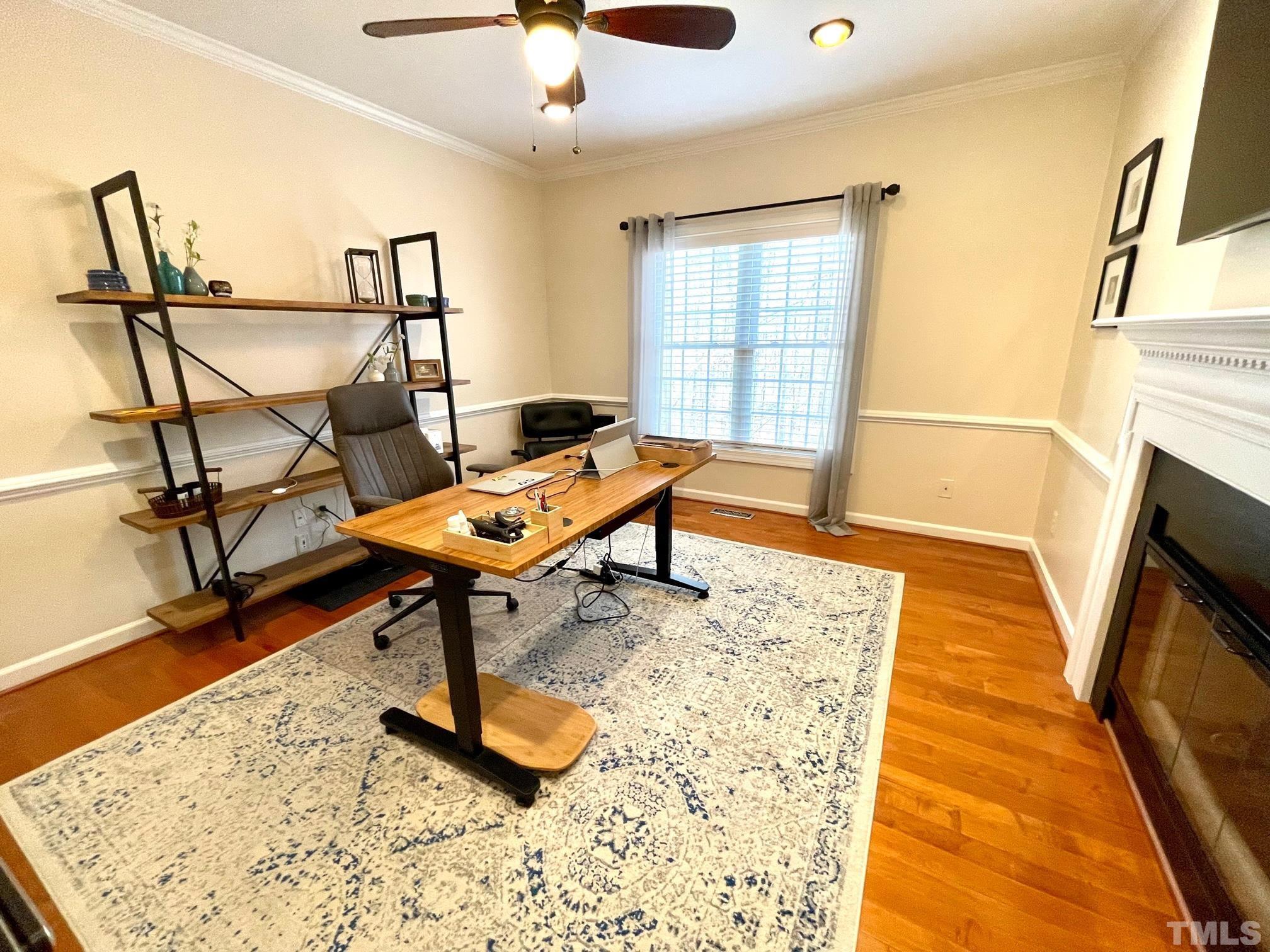 115 Beckford Road Cary, NC 27518 - Photo 49 of 50 a living room with a couch and a rug