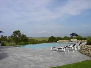 Undisclosed Address West Barnstable, MA 02668 - Photo 2 of 9 a view of a lake with outdoor space and seating area