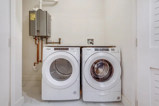 a utility room with dryer and washer