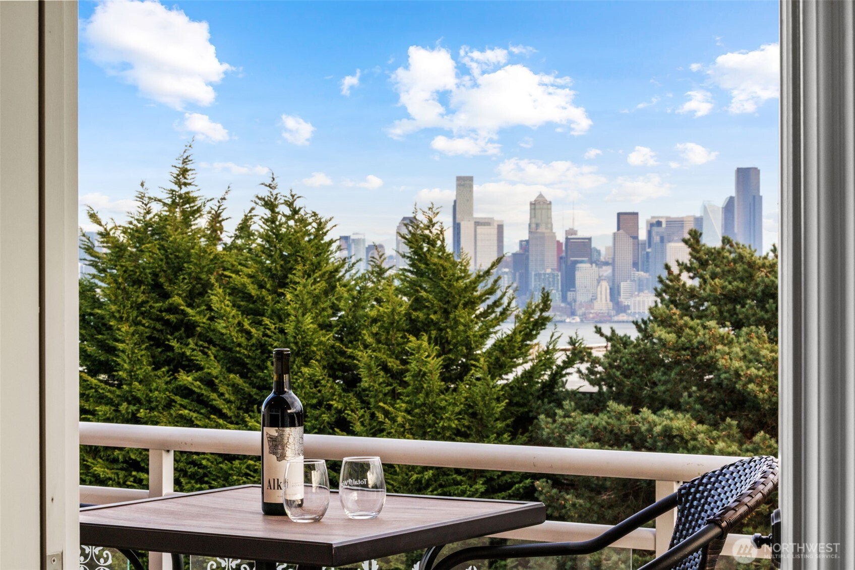 a view of a balcony with furniture