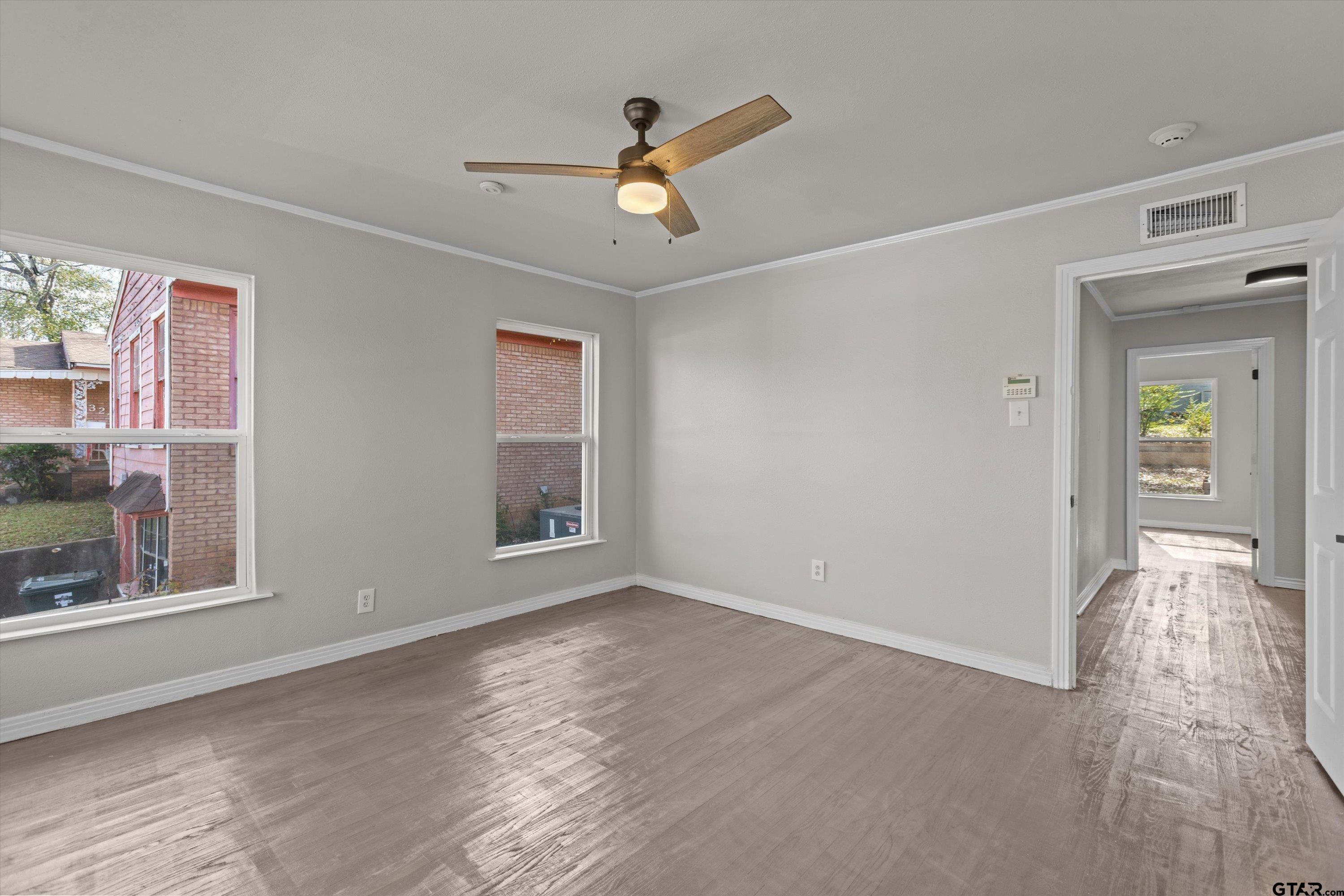 1330 Graham Drive Tyler, TX 75701 - Photo 11 of 22 a view of an empty room with a window