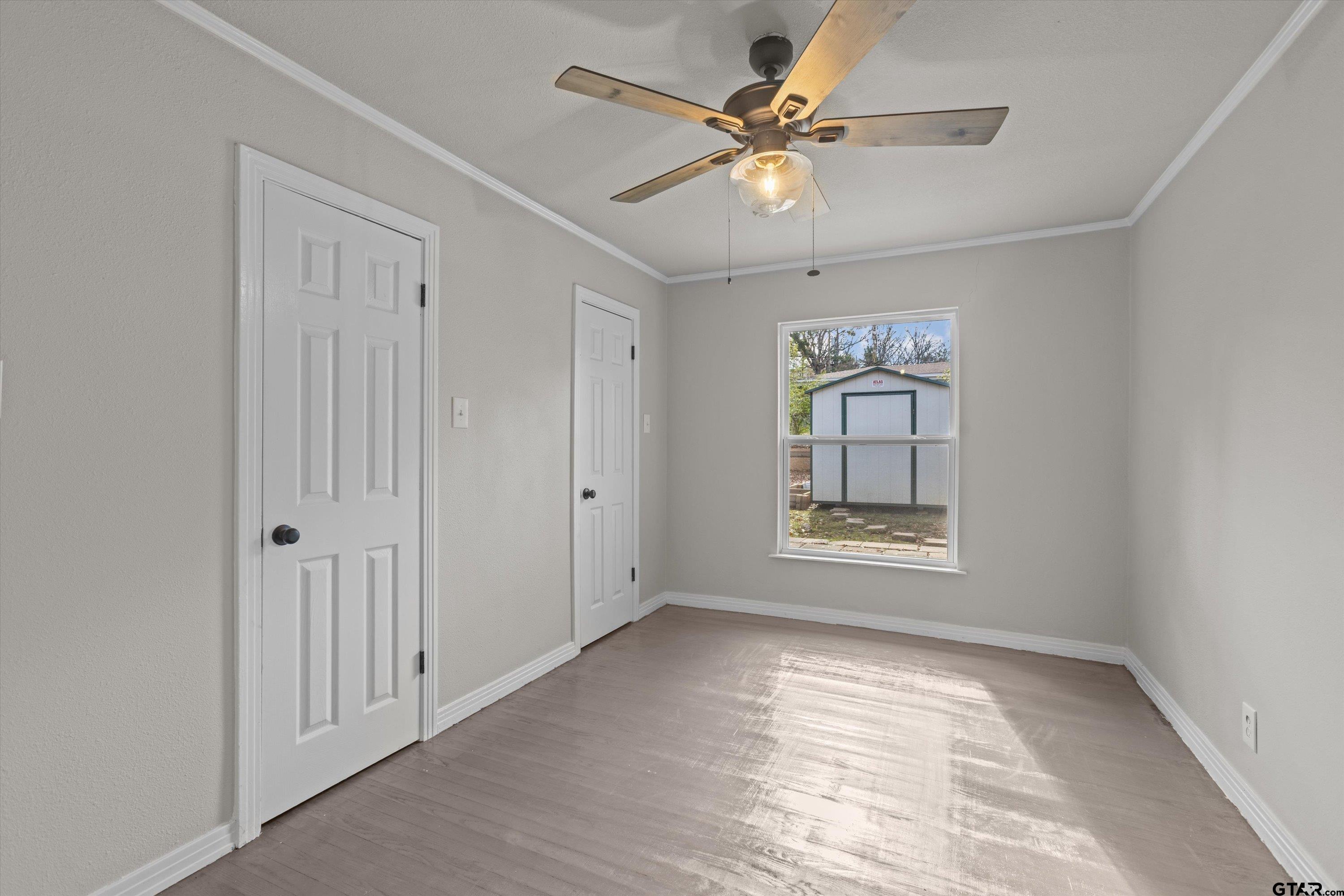 1330 Graham Drive Tyler, TX 75701 - Photo 12 of 22 a view of an empty room with a window