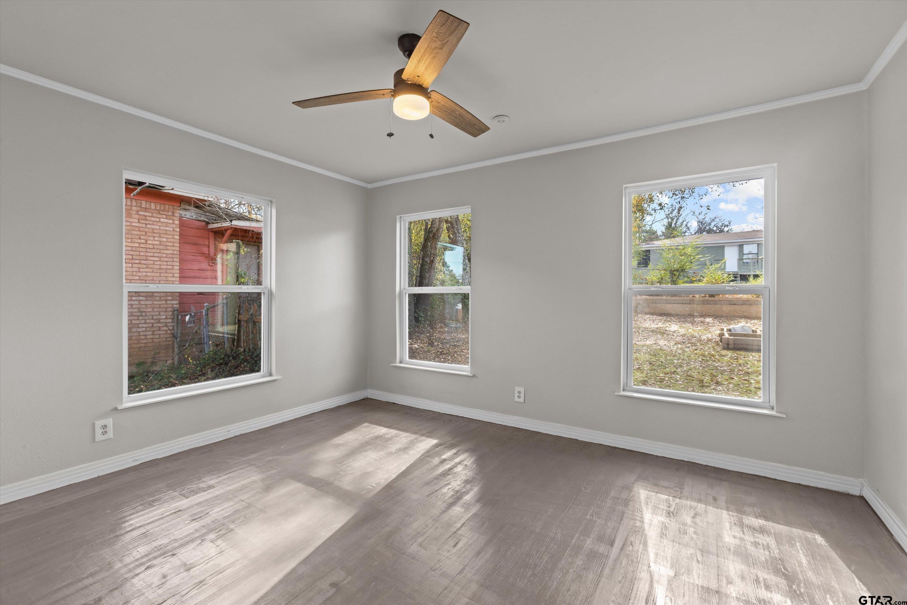 1330 Graham Drive Tyler, TX 75701 - Photo 14 of 22 a view of an empty room with a window