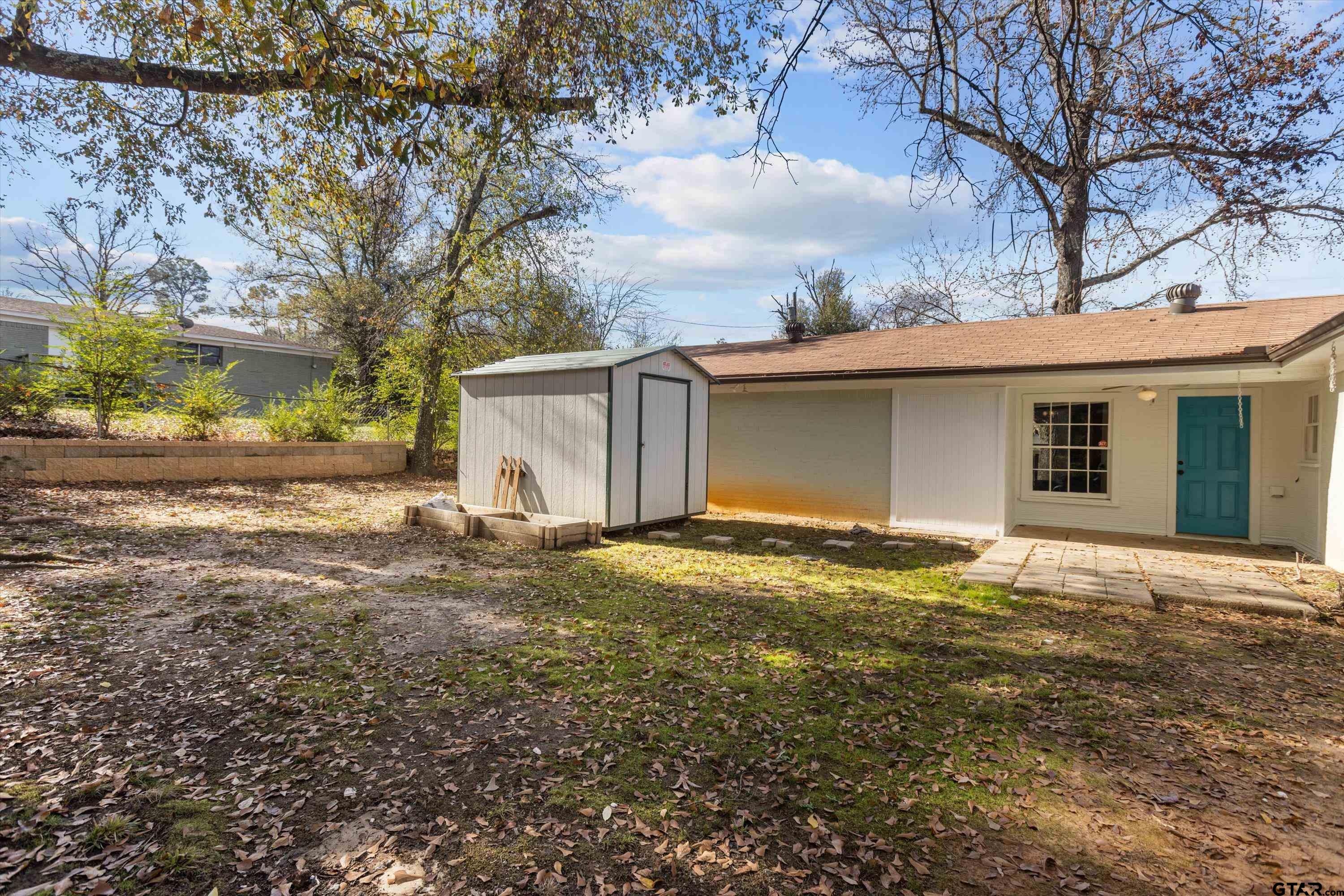 1330 Graham Drive Tyler, TX 75701 - Photo 20 of 22 a bathroom with a sink and yard