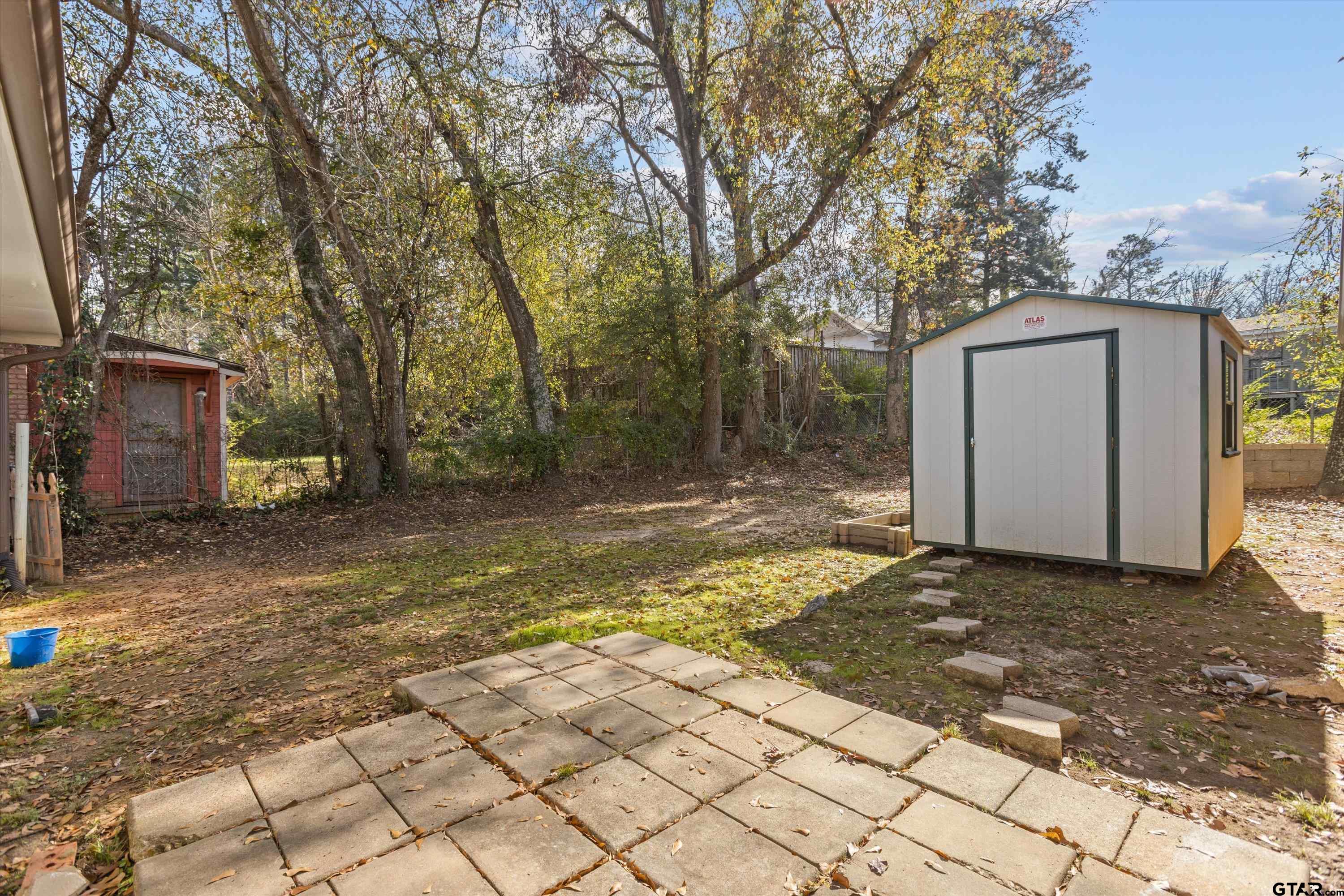 1330 Graham Drive Tyler, TX 75701 - Photo 22 of 22 a view of a backyard of the house