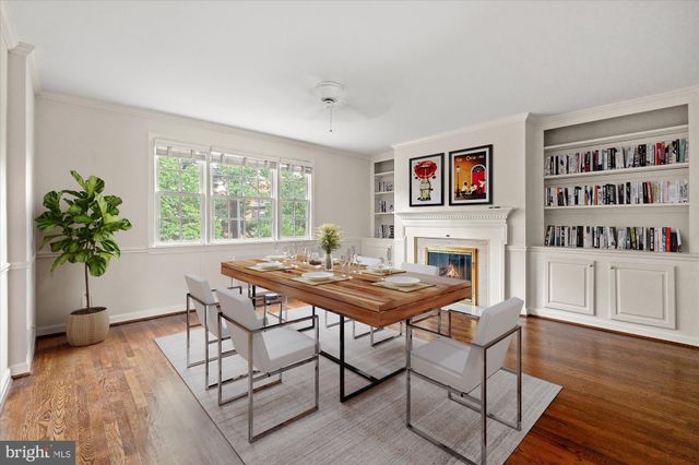 a view of a livingroom with furniture and a potted plant