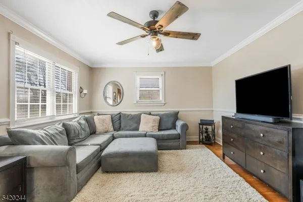 a spacious bedroom with a bed and a fireplace