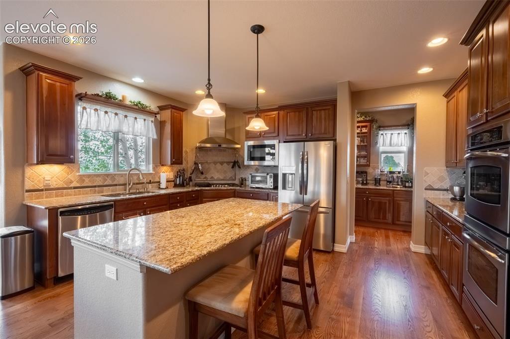 2385 Antelope Ridge Trail Parker, CO 80138 - Photo 18 of 47 KITCHEN ISLAND GRANITE COUNTERS