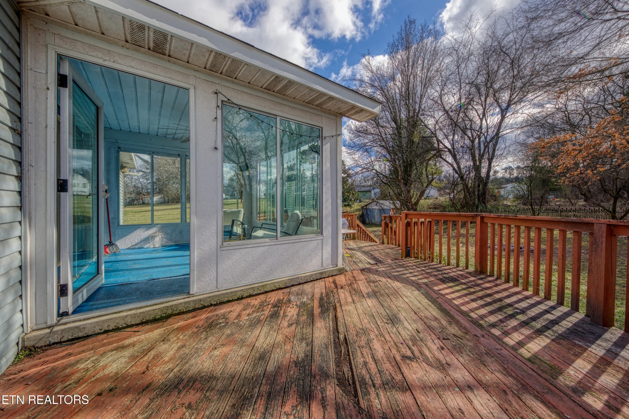 7700 McDaniel Road Knoxville, TN 37924 - Photo 9 of 18 a view of backyard with a deck and wooden floor