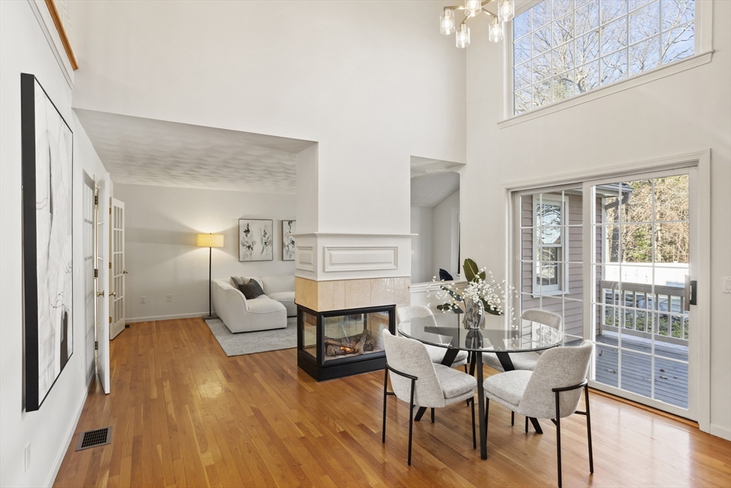 7 Eagles Nest Road Westford, MA 01886 - Photo 11 of 42 a view of a dining room with furniture and wooden floor