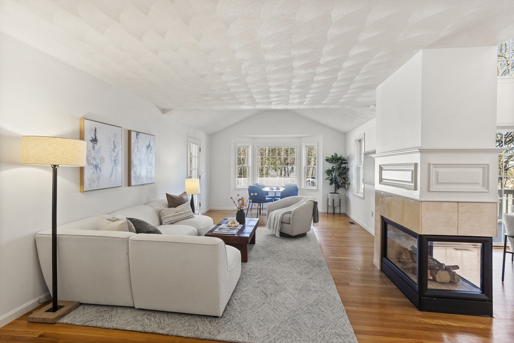 7 Eagles Nest Road Westford, MA 01886 - Photo 13 of 42 a living room with furniture and a wooden floor