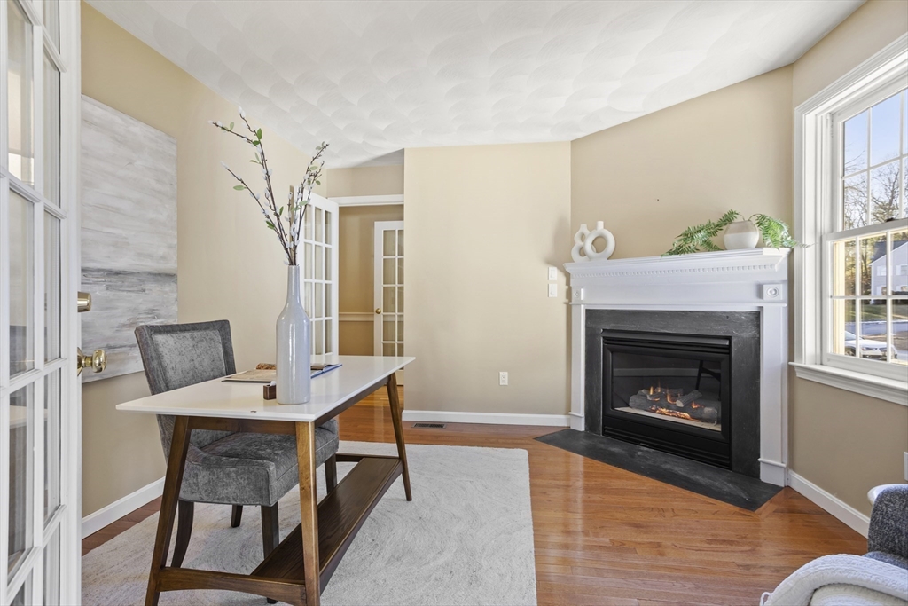 7 Eagles Nest Road Westford, MA 01886 - Photo 21 of 42 a workspace with furniture and fireplace