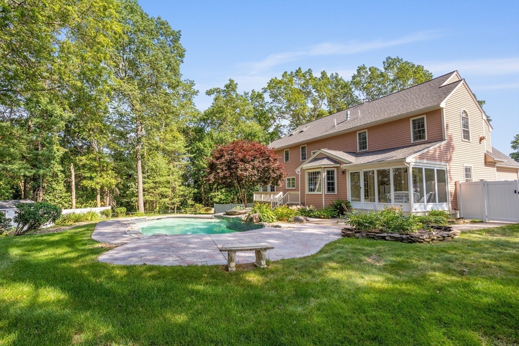 7 Eagles Nest Road Westford, MA 01886 - Photo 36 of 42 a front view of a house with a yard