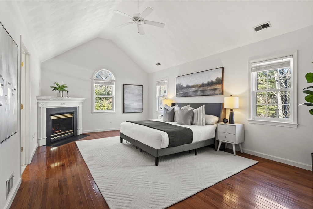 7 Eagles Nest Road Westford, MA 01886 - Photo 4 of 42 a bed room with furniture and a fireplace