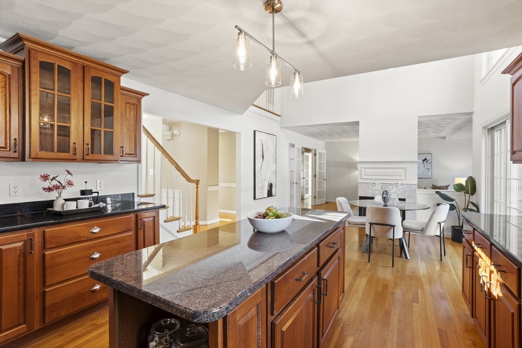 7 Eagles Nest Road Westford, MA 01886 - Photo 7 of 42 a living room with granite countertop lots of counter space and furniture