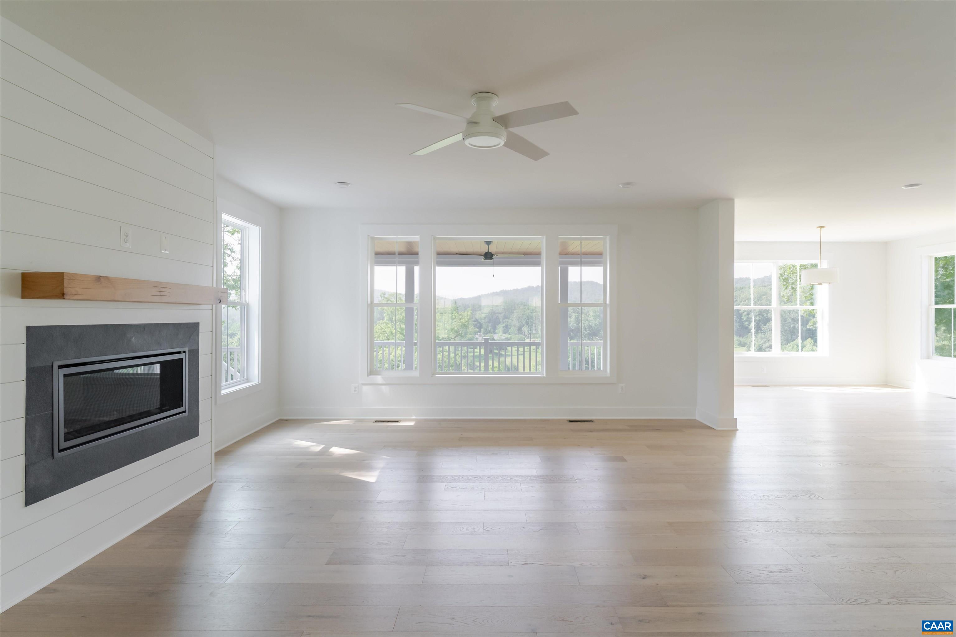 0 Free Union Road Charlottesville, VA 22901 - Photo 8 of 21 a view of an empty room with wooden floor fireplace and a window