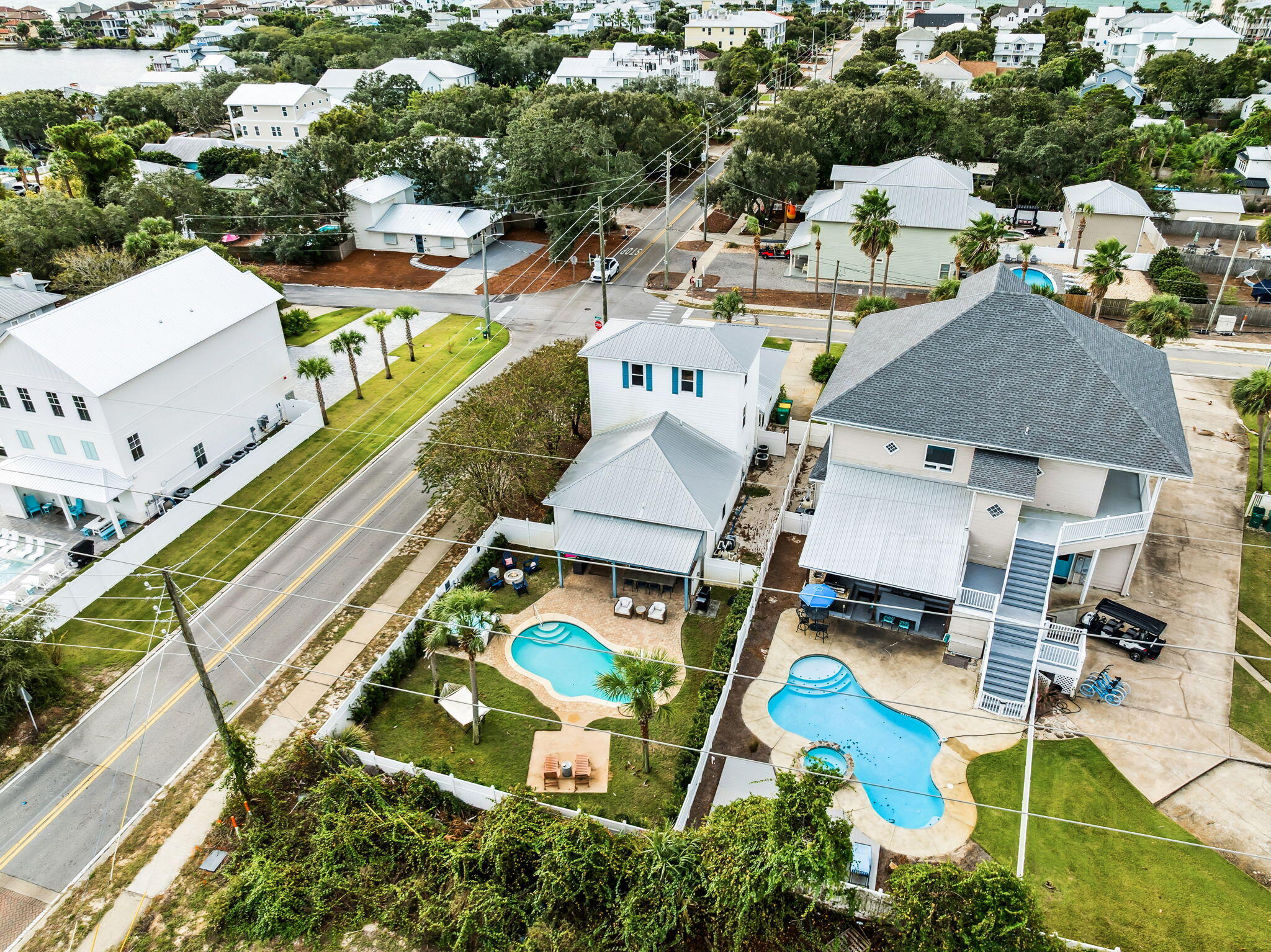 4585 Luke Avenue Destin, FL 32541 - Photo 19 of 50 an aerial view of a house with a swimming pool and outdoor seating