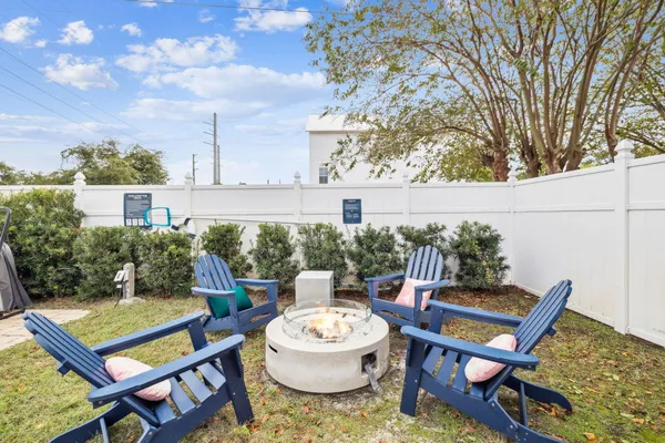 a patio with a table and chairs