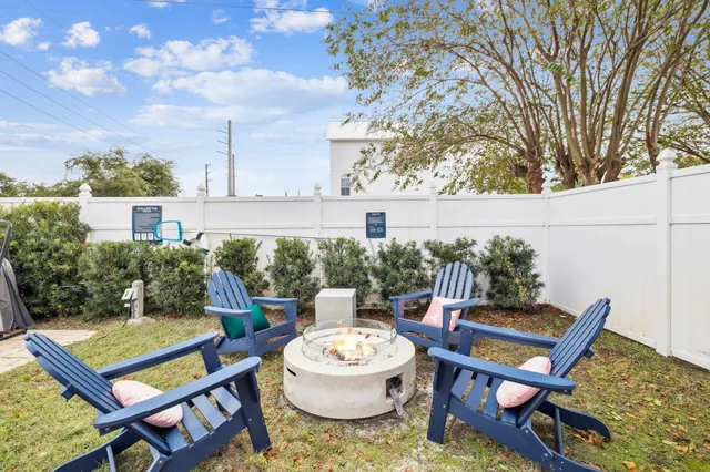 a patio with a table and chairs