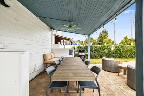 a outdoor dining space with furniture and outdoor space