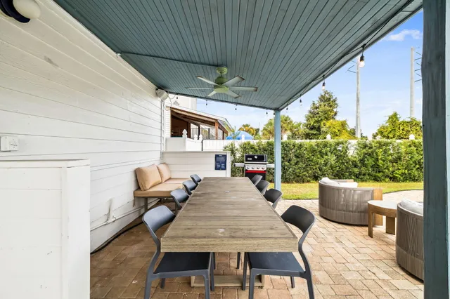 a outdoor dining space with furniture and outdoor space