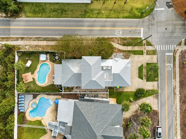 a view of swimming pool with outdoor seating