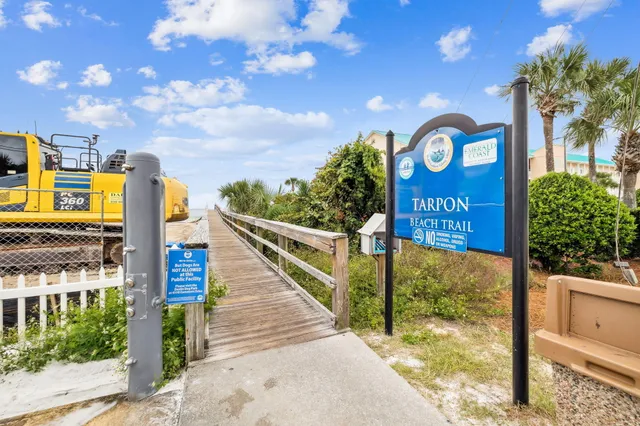 a sign on the side of a street