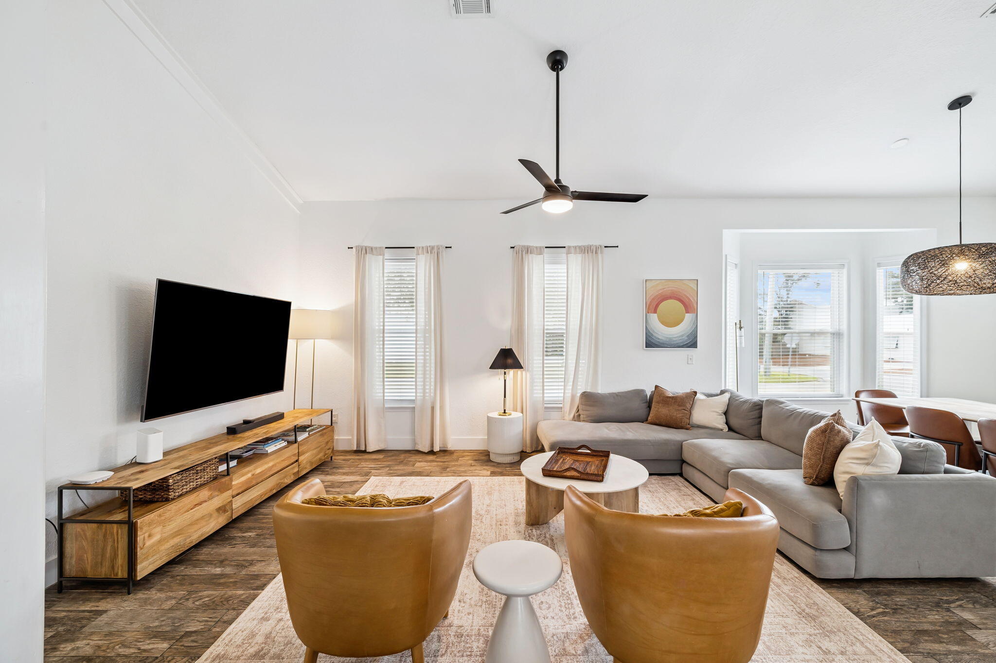 4585 Luke Avenue Destin, FL 32541 - Photo 7 of 50 a living room with furniture and a flat screen tv