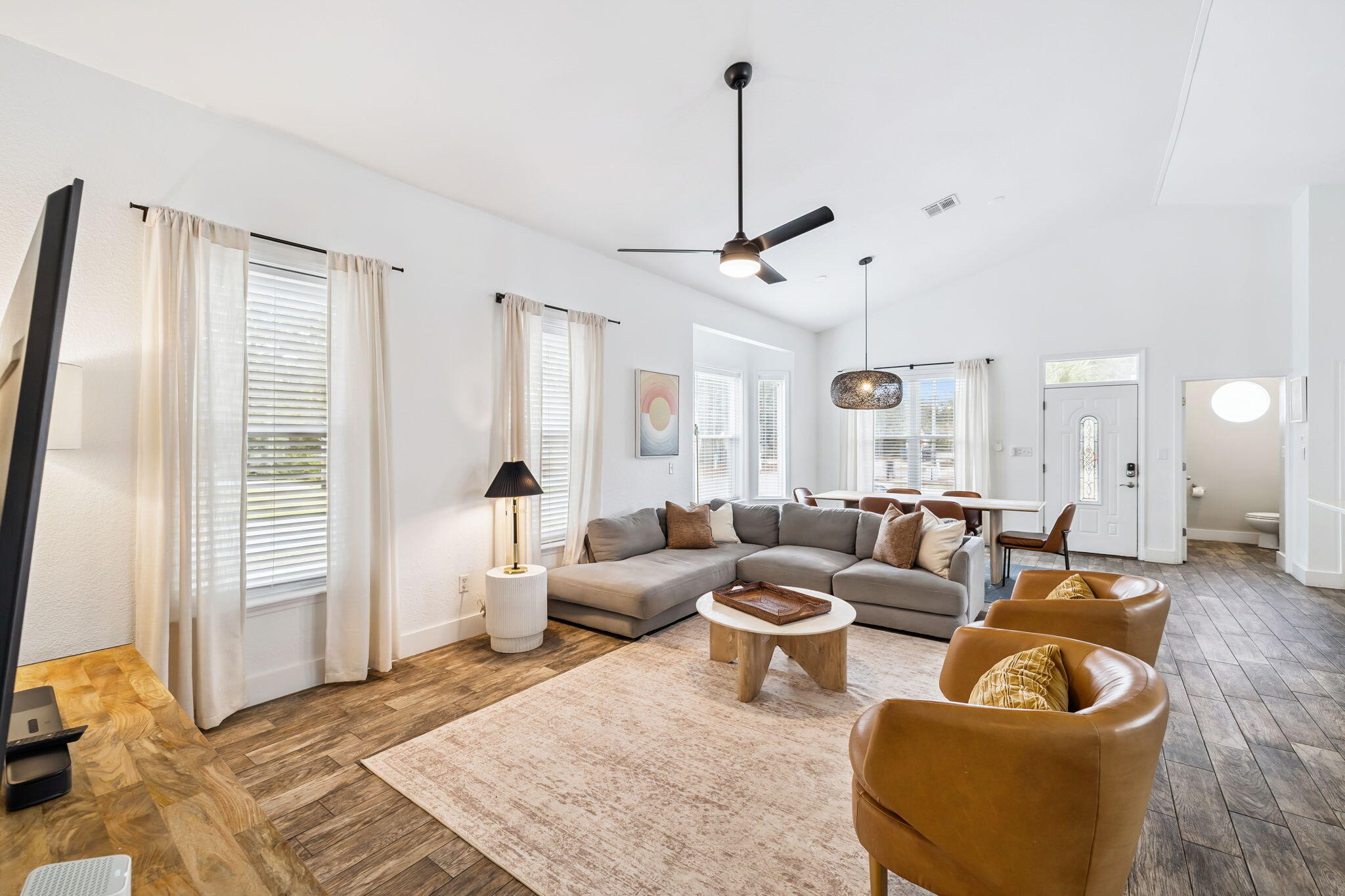 4585 Luke Avenue Destin, FL 32541 - Photo 9 of 50 a living room with furniture and a large window