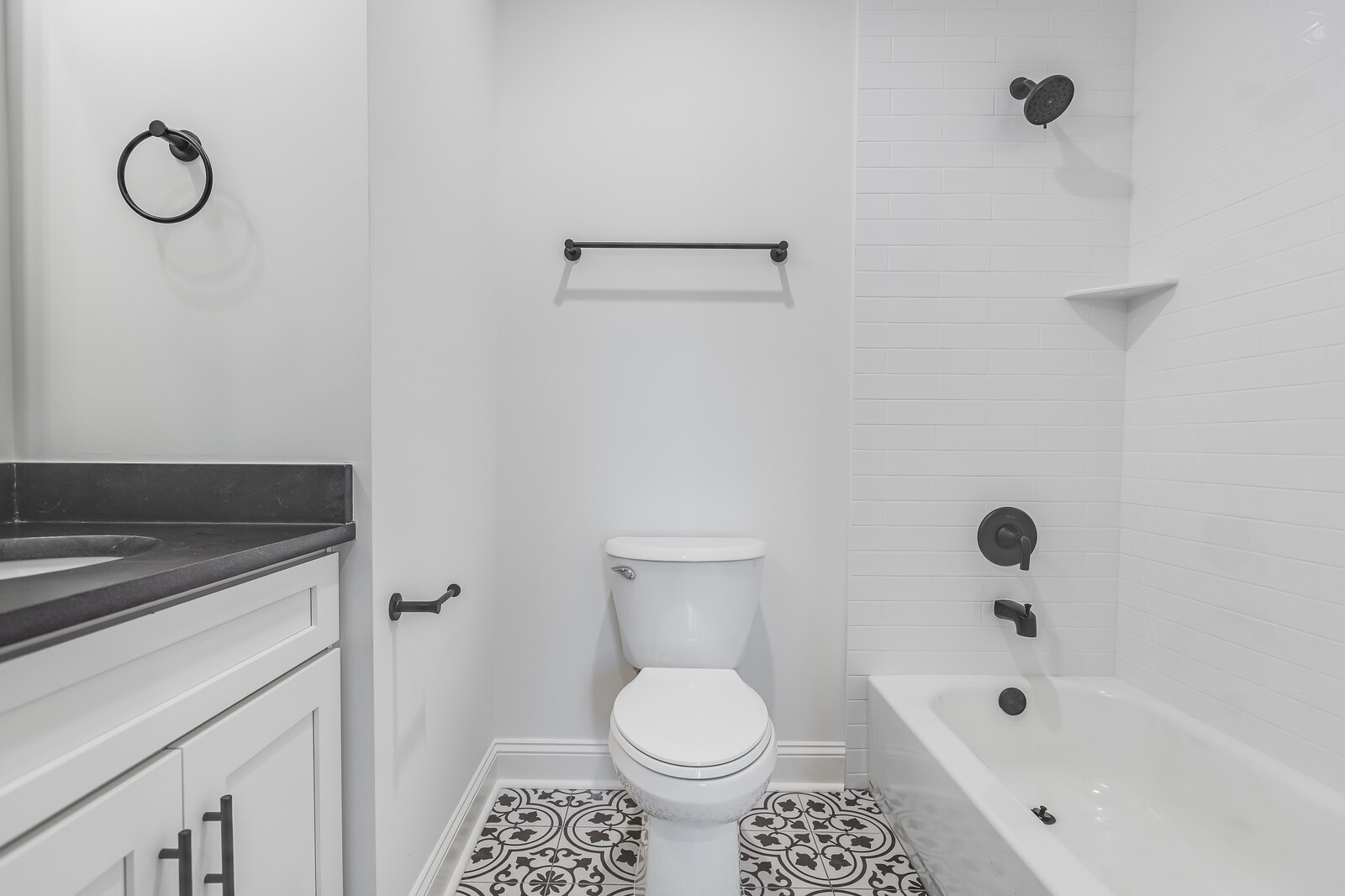 45055 Luther Street Callahan, FL 32011 - Photo 10 of 17 a bathroom with a sink a toilet and a bathtub